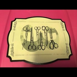 Scissors ✂️ on metal sign